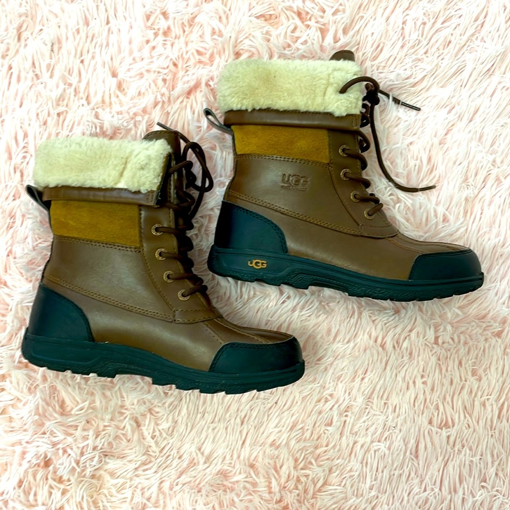 Size 5 kid UGG Boots. Brown laced up.